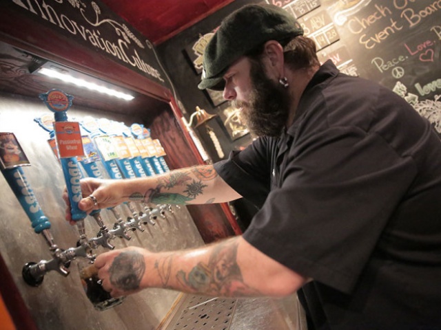 JDub’s Brewing Company Pouring Beer
